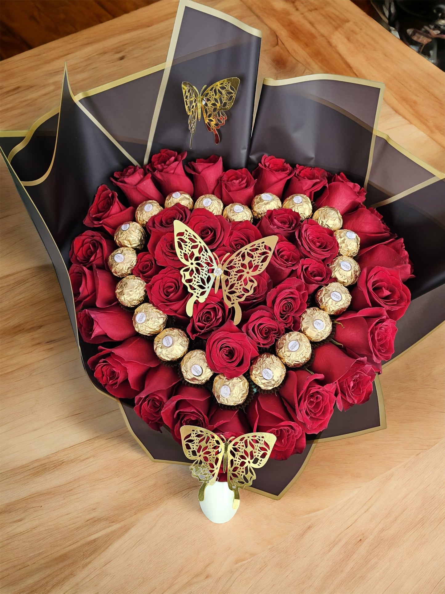 Bouquet of Precious Red Roses and Chocolate in a Heart Shaped wrapped in Black image 0