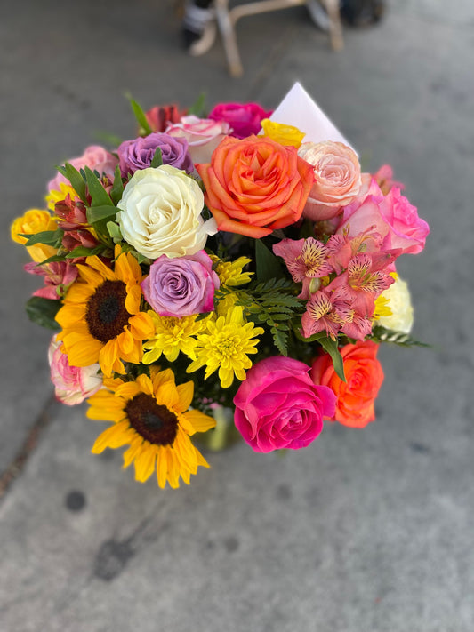 Colorful Assorted roses mix with flowers and sunflowers image 1