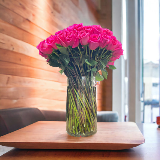 100 Hot Pink Premium Roses in Large vase image 1