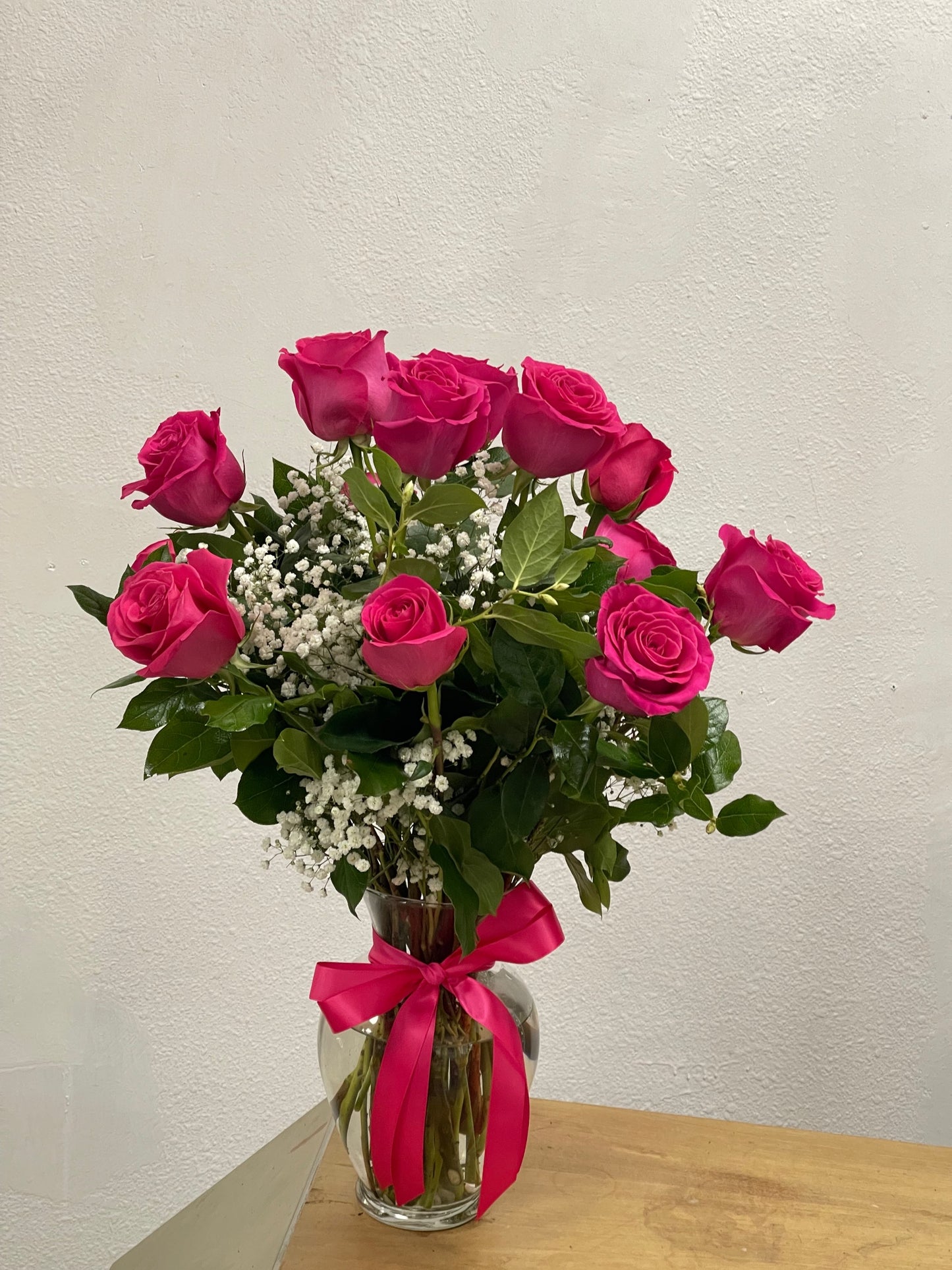 13 Premium Hot Pink Roses in Glass vase image 0