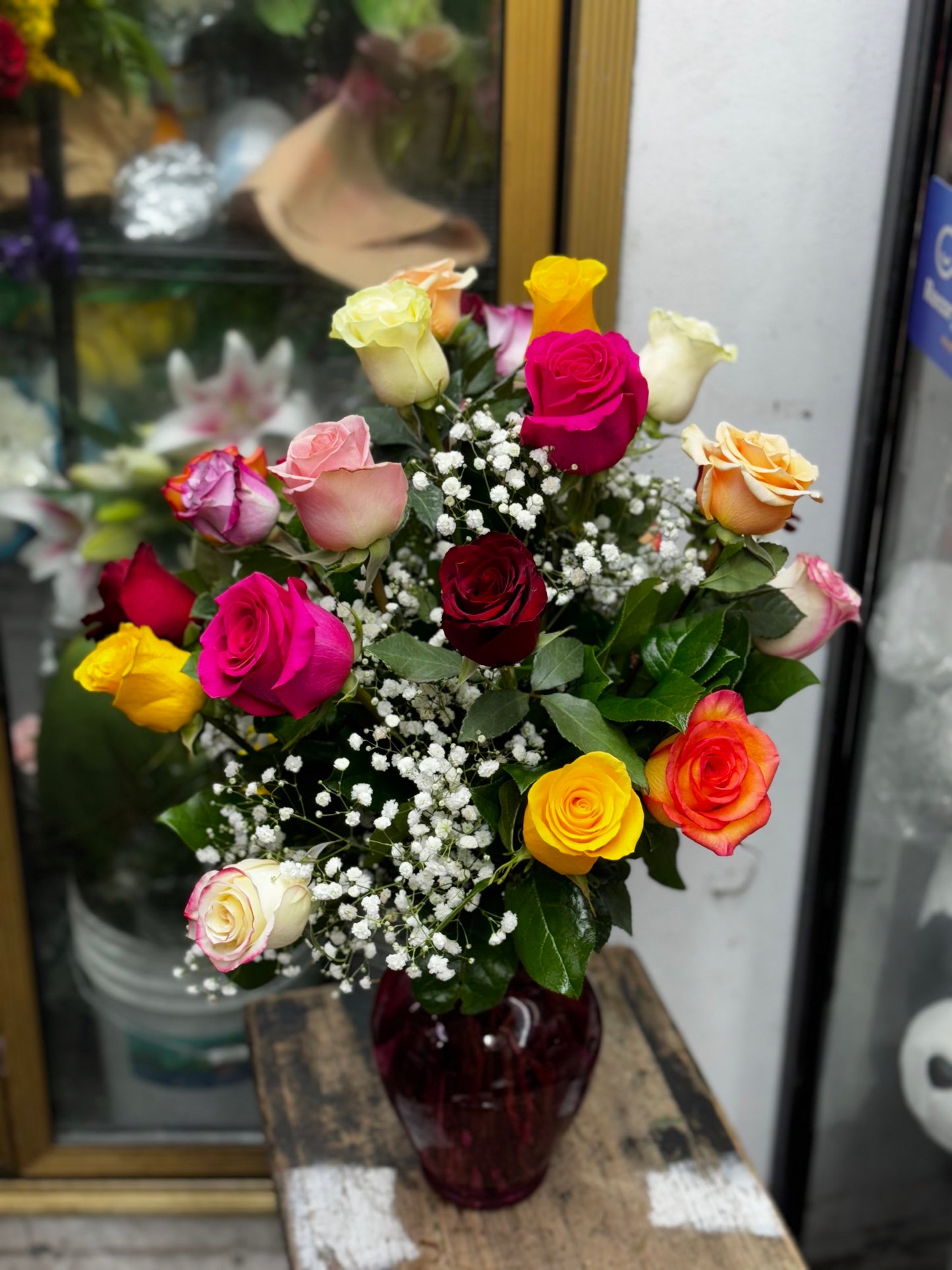 25 Beautiful Rainbow of Roses in a Glass vase image 0