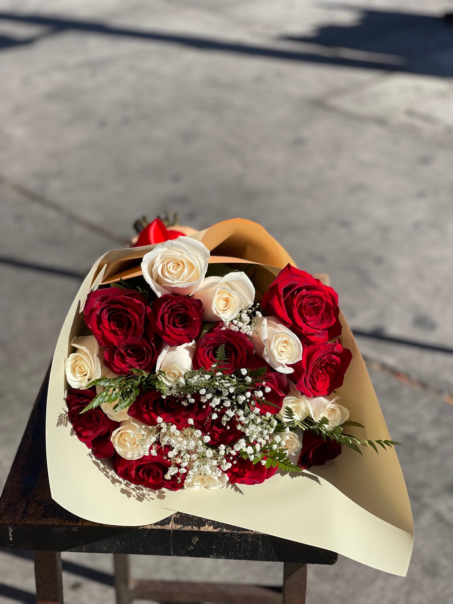 25 (2 doz+1) Premium Deep Red and white Roses Wrapped in black paper image 0