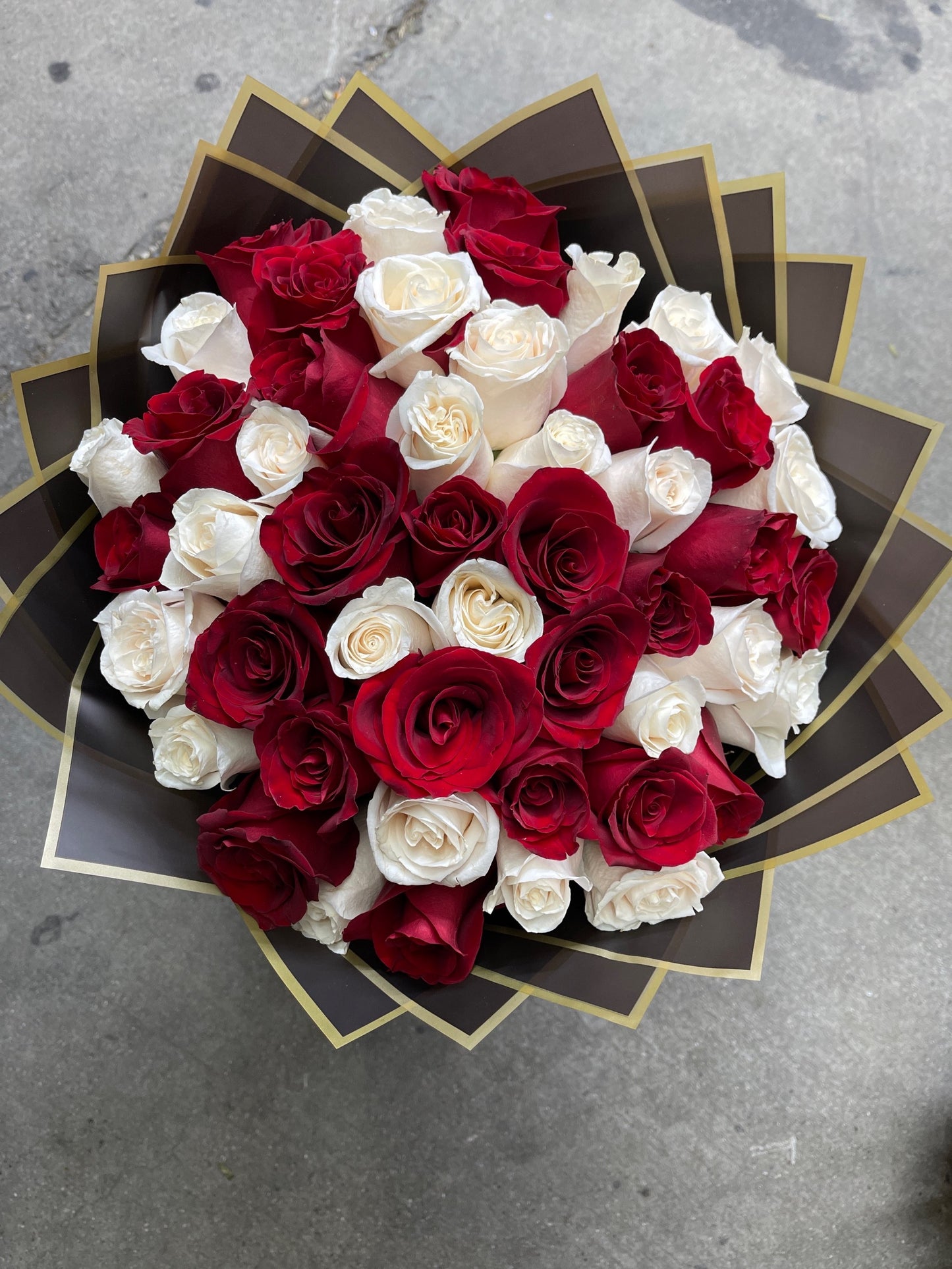 50 Premium White and Red Roses wrapped in special paper image 0