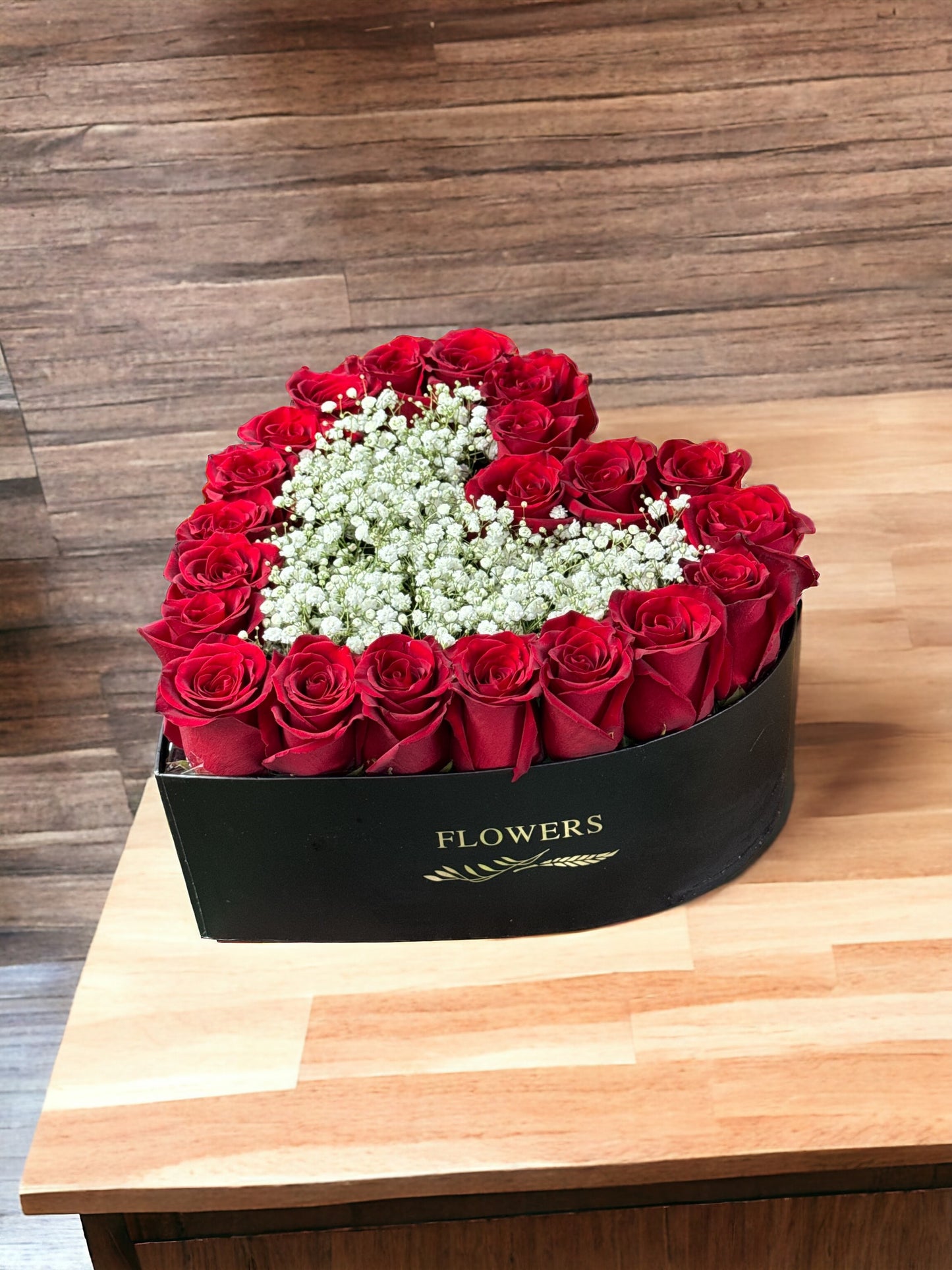 Beautiful roses in a hear box image 0