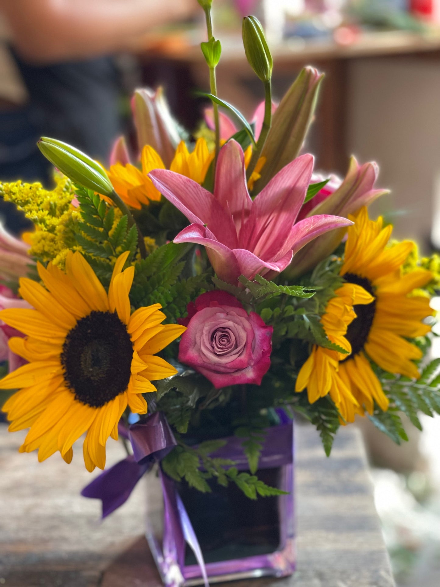Purple roses and Sunflowers perfect for the office image 0