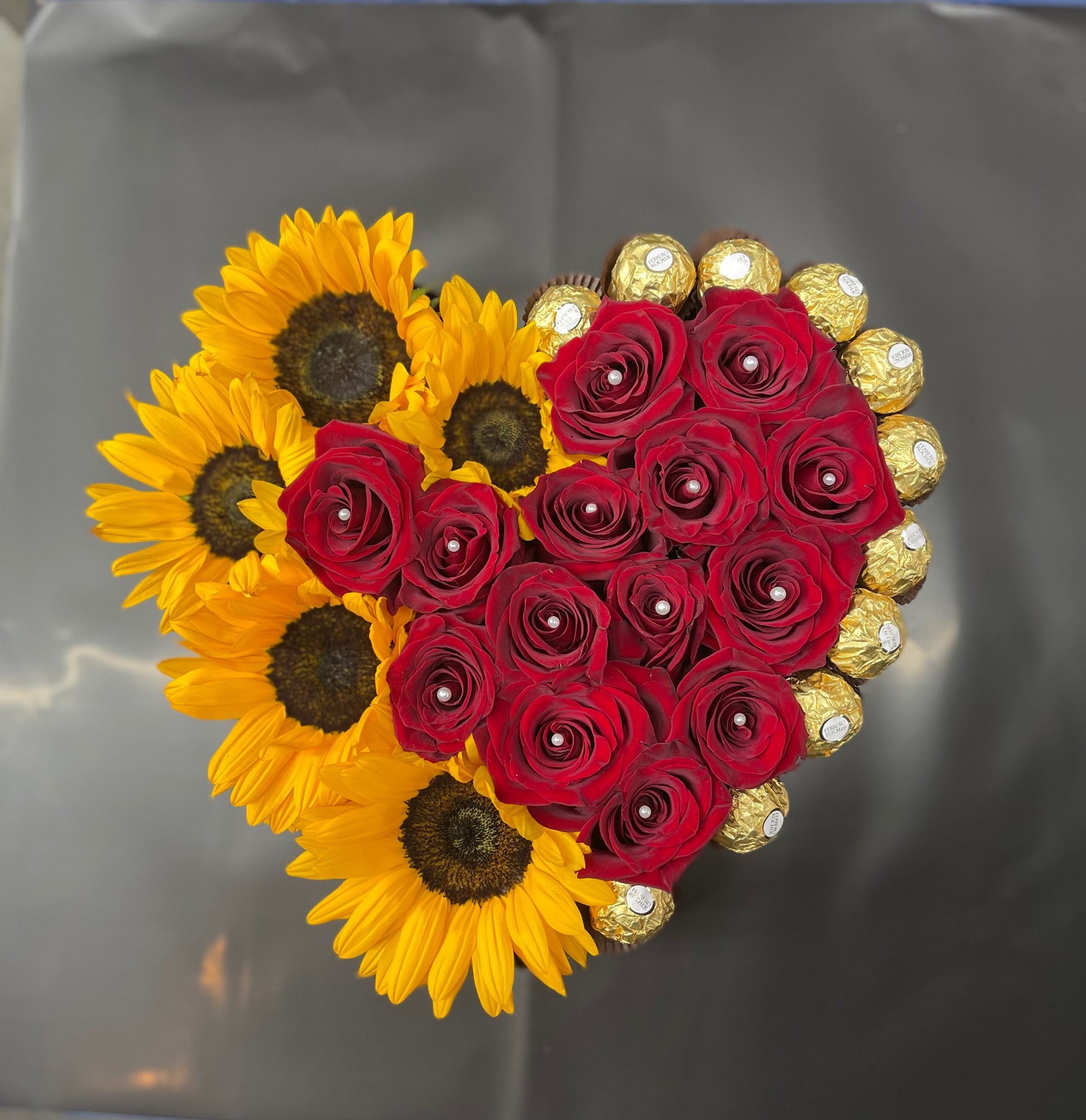 Medium Heart Shape Box filled with Roses and Sunflowers plus Chocolate Ferrero  image 0
