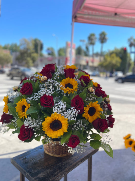 Big Arrangement of 50 Roses mixed with sunflowers in a basket  image 0