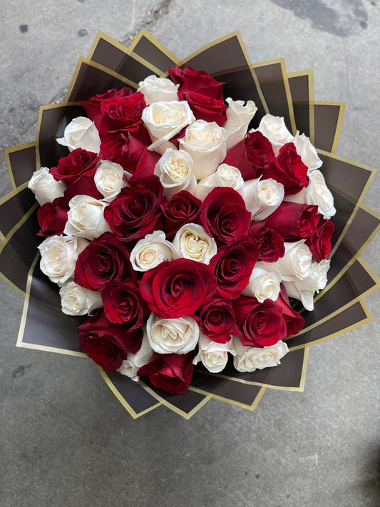 50 Premium White and Red Roses wrapped in special paper  image 0