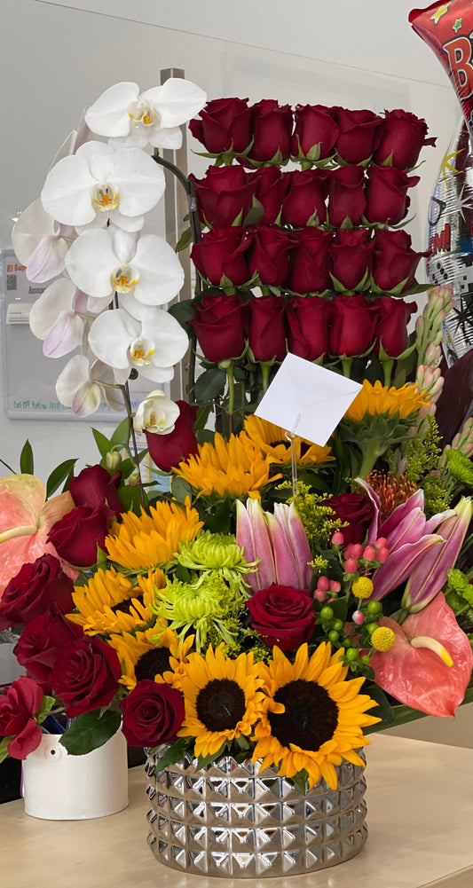 Large Rose and Orquid Arrangement in a ceramic vase  image 0